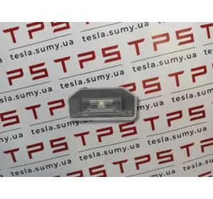 Ліхтар підсвічування номерного знака заднього б/в Tesla Model 3, 1449730-00-B
